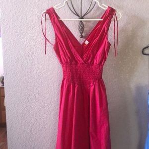Divided woman’s pink sundress size small